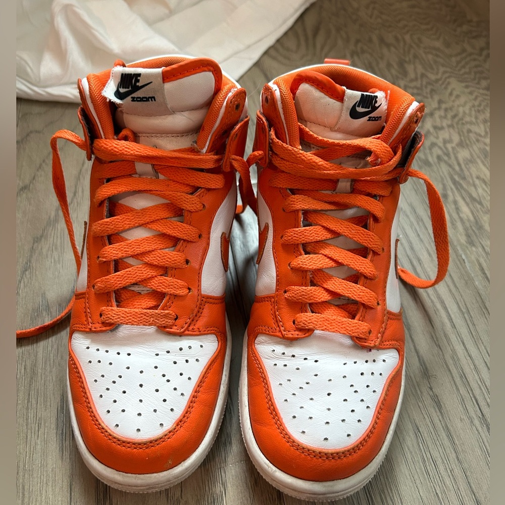 Orange nike shoes